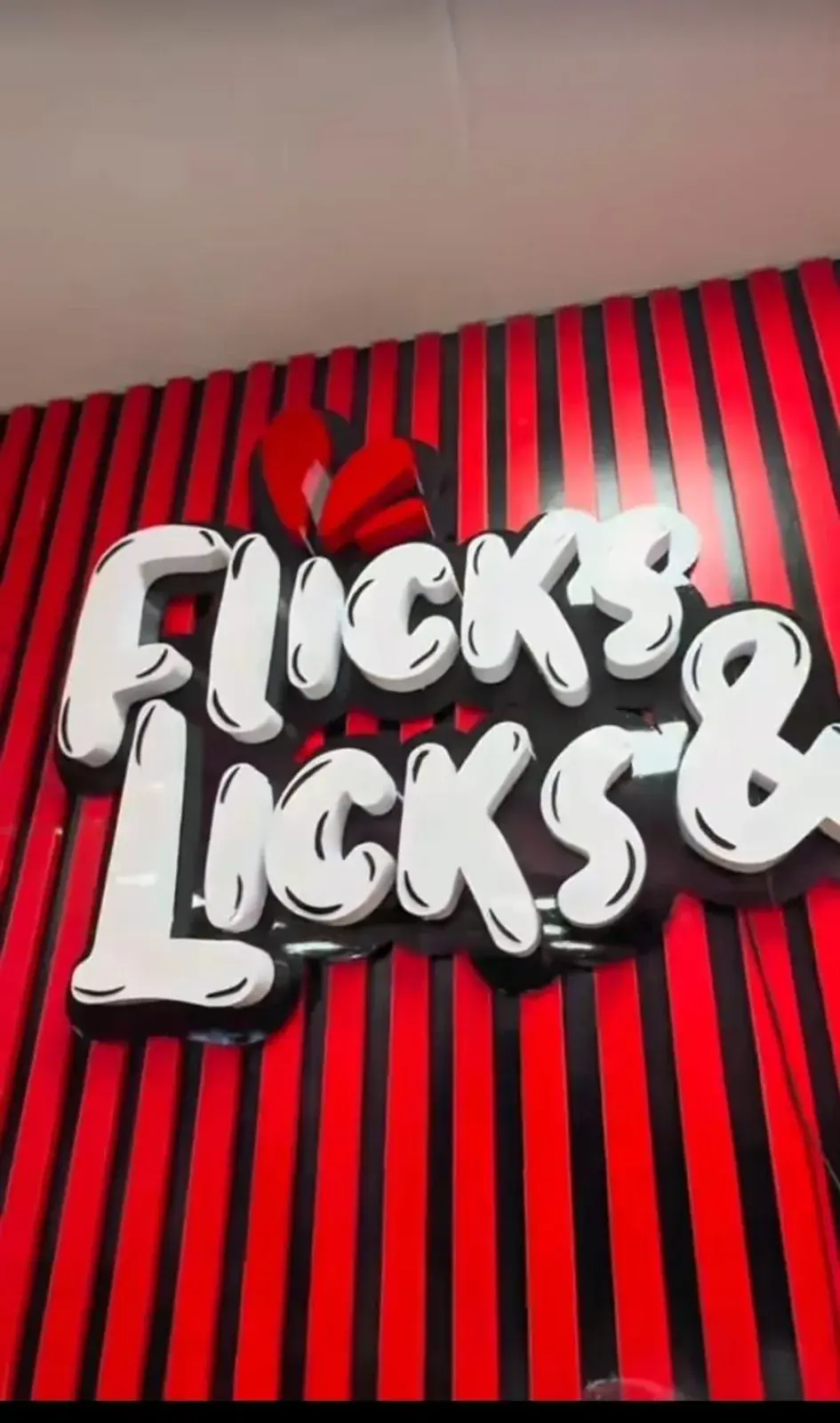 Flicks & Licks red and black signage