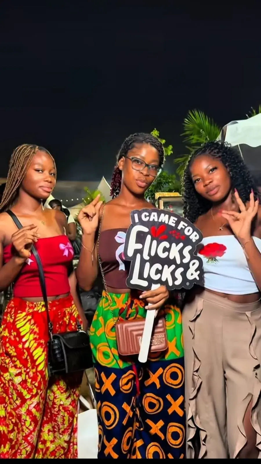 Friends celebrating a night out at Flicks & Licks